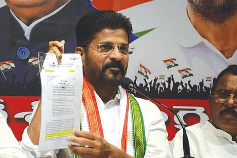 TPCC chief A Revanth Reddy addresses the media in Hyderabad on Tuesday