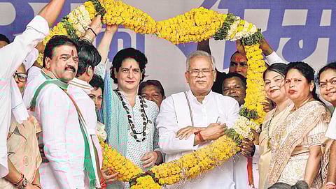 Priyanka Gandhi Vadra with Chief Minister Bhupesh Baghel at the ‘Bharose Ka Sammelan’ organised by Congress, in Bastar on Thursday. (Photo | PTI)
