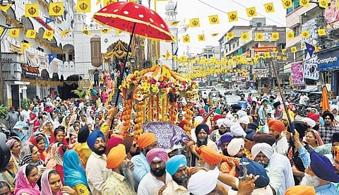 Members of the Sikh community take the Guru Granth Sahibji in a holy procession from Gurudwara Saheb Ameerpet, Hyderabad (Photo | Vinay Madupu)