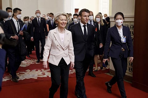 French President Emmanuel Macron and European Commission President Ursula von de Leyen (L) arrive for a working session with Chinese President Xi Jinping in Beijing, on April 6, 2023. (Photo |AP)