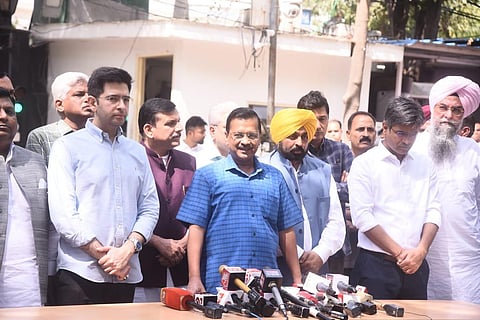 Delhi CM Arvind Kejriwal along with Punjab CM Bhagwant Mann, partys Rajya Sabha MPs Sanjay Singh and Raghav Chadha addresses a press conference just before his CBI visit, in New Delhi.| Parveen Negi