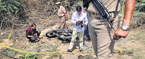 Police personnel at the site of the 'encounter' killing of Asad Ahmed in Jhansi.