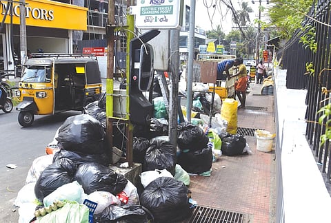As legacy waste woes build, Kerala Hotel Association's collection system draws criticism