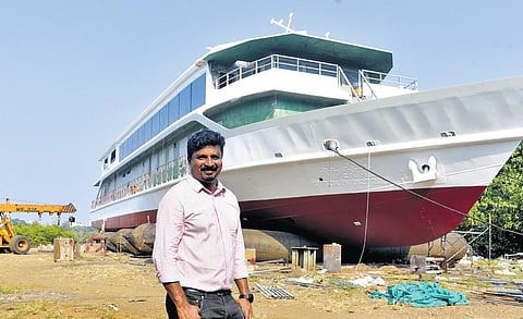 Nishijith K John in front of newly built Classic Imperial ship at Ramanthuruth, near Vallarpadam, on Sunday | A Sanesh