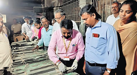 A team of experts from HR&CE department inspecting the copper plates | Express
