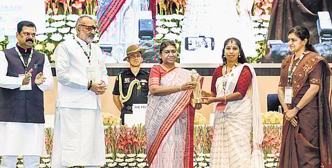 President Droupadi Murmu presents National Panchayat Awards at the National Panchayati Raj Day celebration at Vigyan Bhavan in New Delhi on Monday | pti