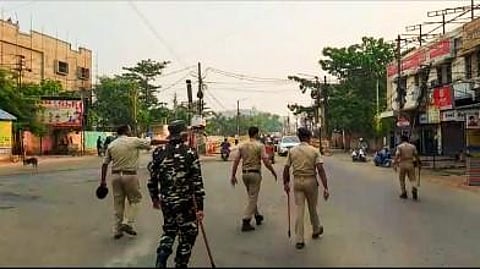 Security personnel during a curfew imposed after the incident of fresh violence on the occasion of Hanuman Jayanti, in Sambalpur on April 15, 2023. (Photo | PTI)