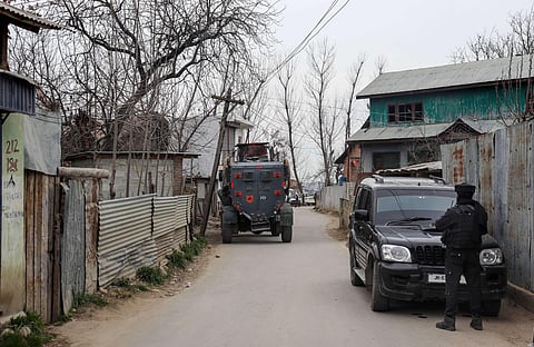 Representational Image: A security personnel stands guard after a Kashmiri Pandit was shot dead by terrorists at Achan area in Pulwama. (Photo | PTI)