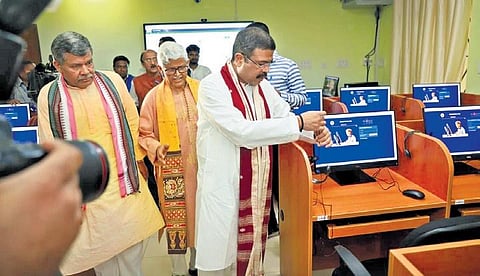 Union Education Minister Dharmendra Pradhan at the work station unveiled by him at CUO on Saturday | Express