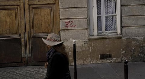 People walk past the 'Modern bakery', Place de d'Estrapade, in Paris, Wednesday, April 19, 2023. (Photo | AP)