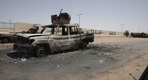 Destroyed military vehicles are seen in southern in Khartoum, Sudan. (Photo | PTI)