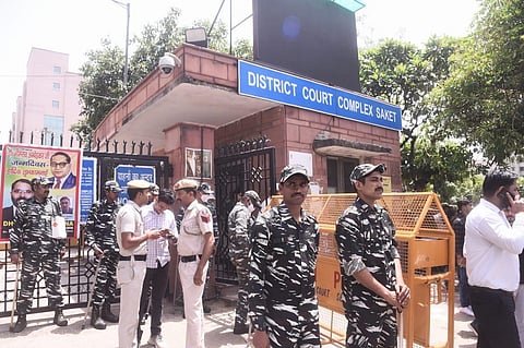 Heavy security and media presence outside Saket court after a shooting incident inside the court premises in New Delhi on Friday. (Photo | Parveen Negi, EPS)