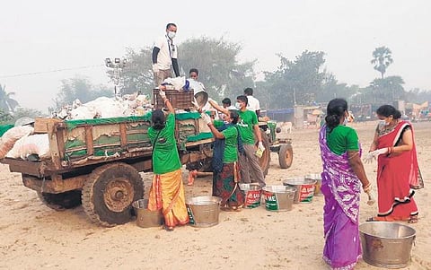 Eco-changemakers removing waste from the festival site in Deulapada | Express