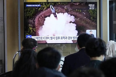 A TV screen shows a file image of North Korea's missile launch during a news program at the Seoul Railway Station in Seoul, South Korea, Wednesday, April 19, 2023. (Photo | AP)