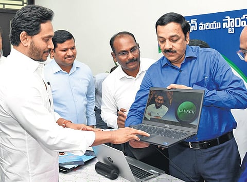 Chief Minister YS Jagan Mohan Reddy launches e-stamping services at his camp office in Tadepalli on Friday I Express