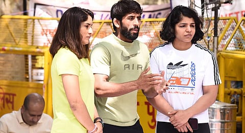 Wrestlers Bajrang Punia, Vinesh Phogat, Sakshi Malik during a protest against WFI President Brij Bhushan Sharan singh at Jantar Mantar .(Photo | Parveen Negi, EPS)
