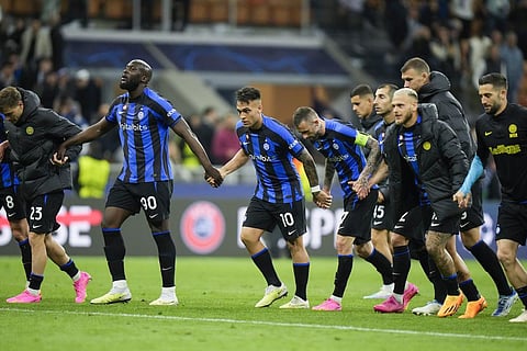 Inter Milan's players celebrate at the end of the Champions League quarterfinal second leg soccer match between Inter Milan and Benfica at the San Siro stadium in Milan, Italy. (Photo | AP)