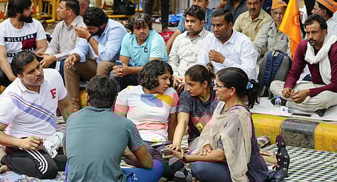 Wrestlers Vinesh Phogat, Sakshi Malik and others during their protest at Jantar Mantar, in New Delhi, Wednesday, April 26, 2023. (Photo | PTI)