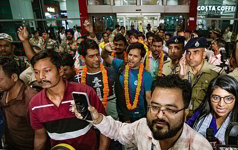 Indians evacuated from violence-hit Sudan under Operation Kaveri arriving at the IGI Airport in New Delhi on Wednesday (Photo | PTI)