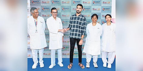 Pranesh Vishnu with MIOT International therapist