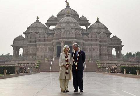 FILE PHOTO | Britain's Prince Charles speaks with his wife Camilla, the Duchess of Cornwall, during their visit to Akshardham temple in New Delhi, India, Friday, Nov. 8, 2013. (Photo | AP)