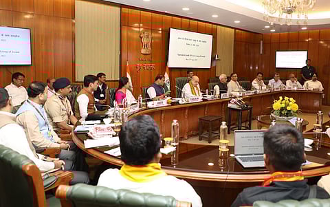 Assam CM Himanta Biswa Sarma, Amit Shah and other officials at the signing of the agreement in New Delhi. ( Photo | Special arrangement )