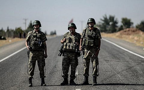 Representational image: Turkish soldiers standing guard near the Turkish-Syrian border. (File | AP)