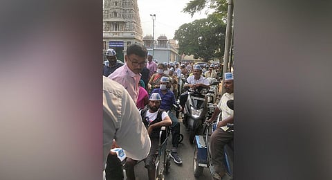 Differently-abled persons participate in AAP’s campaign in Bengaluru on Wednesday. (Photo | Express)