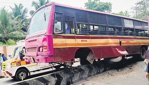 An MTC bus met with an accident and rammed on the centre median at New Avadi road near Aynavaram on Wednesday | express