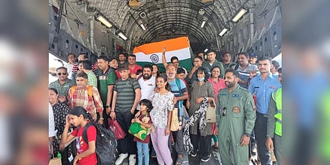 People evacuated from Sudan express their joy after landing in Mumbai. (Photo | Twitter)
