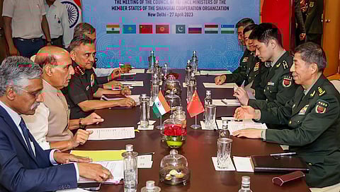 Defence Minister Rajnath Singh with Chinese Defence Minister Li Shangfu in New Delhi (Photo | PTI)