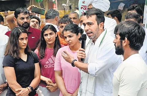 Rashtriya Lok Dal Party’s Jayant Chaudhary with wrestlers on Thursday | shekhar yadav