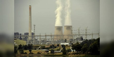 Steam rising from the cooling towers of the Liddell Power Station next to Lake Liddell in the town of Singleton, some 70km (43 miles) from Newcastle, the world's largest coal exporting port.