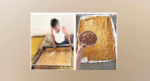 dried marigold leaves are a natural dye; the reed mat through which the paper pulp is seived.