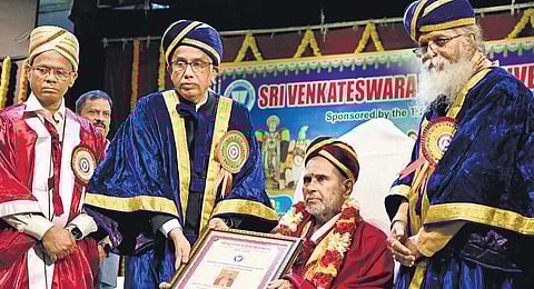 Governor and Chancellor of Sri Venkateswara Vedic University S Abdul Nazeer conferring Mahamahopadhyaya to Brahmasri V Subrahamanya Sastri on Friday. (Photo | Madhav K, EPS)