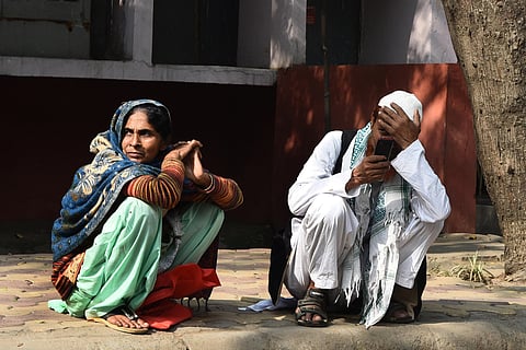 FILE: (Feb 2020) Md Ibrahim & Gulshan Khatoon, parents of Mubarak (35) who was killed in a communal violence in northeast Delhi, wait outside the mortuary of GTB hospital. (Photo | Partveen Negi/EPS)