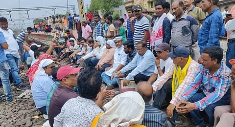 Public agitation at Kalunga near Rourkela over demand for train stoppages on Sunday. (Photo | Express)
