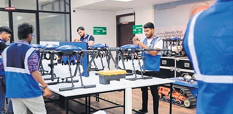 Engineers at Garuda Aerospace in Chennai; (inset) founder and CEO of the firm, Agnishwar Jayaprakash | Express