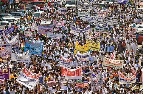 Doctors take part in a protest rally against Rajasthan's Right to Health bill, at MI Road in Jaipur, Tuesday, April 4, 2023. (Photo | PTI)