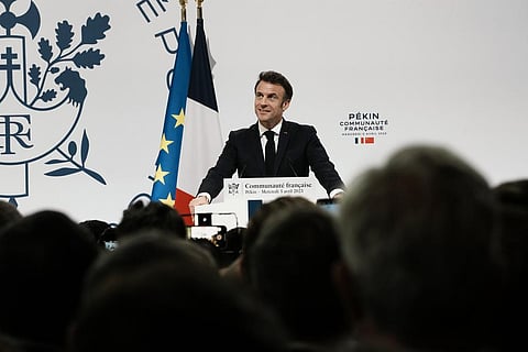 French President Emmanuel Macron gives a speech as he meets the French community, in Beijing, China, Wednesday, April 5, 2023. (Photo | AP)