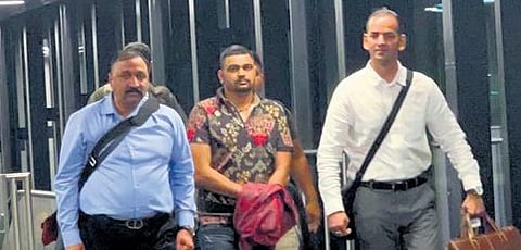Deepak Boxer (centre) at IGI Airport on Saturday | Delhi police