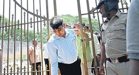 Lokayukta SP Lakshmi Ganesh inspects a property on Wednesday, following a plaint that graves were destroyed to build a BBMP office in JJ Nagar. (Photo | Nagaraja Gadekal, EPS)