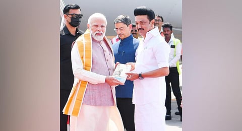 CM MK Stalin presented a book titled 'Gandhi's Travels in Tamil Nadu' to PM when the latter arrived at Chennai airport today