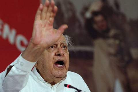 Jammu and Kashmir National Conference MP Farooq Abdullah speaks during an event organised on International Workers' Day, in Jammu, May 1, 2023. (Photo | PTI)