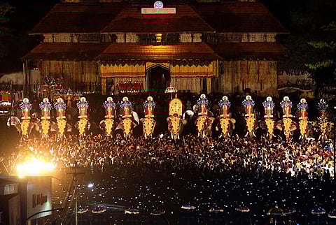 Crowd gathers to witness caparisoned elephants at Thrissur Pooram, in Kerala.