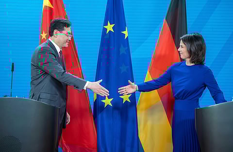 Annalena Baerbock, and her counterpart, Qin Gang, Foreign Minister of China, shake hands during a press conference Berlin, May 9, 2023. ( Photo | AP )