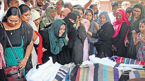 Relatives and residents are inconsolable as bodies of 11 members of a family, who were among the 22 people killed in the Tanur boat tragedy, are kept at Parappanangadi in Malappuram for public. (EPS)