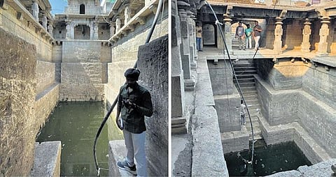 Members of Prathista drain the water from Korutla stepwell in Jagtial district