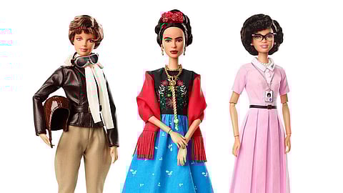 This product image released by Barbie shows dolls in the image of pilot Amelia Earhart, left, Mexican artist Frida Kahlo and mathematician Katherine Johnson, part of the Inspiring Women doll line seri