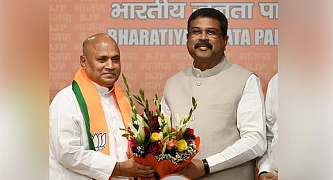 Former JDU leader Ramchandra Prasad (RCP) Singh join BJP in the presence of Dharmander Pardhan. (EPS | Shekhar Yadav)